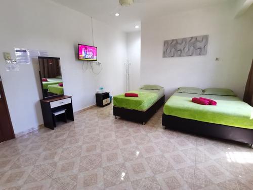 Standard Triple Room with Private Bathroom